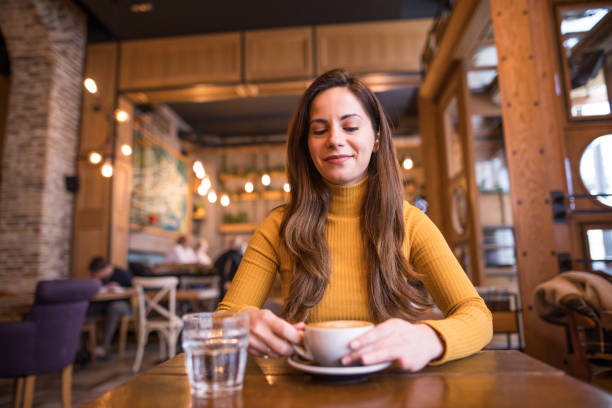 istock I enjoy a cappuccino and a break from work in my favorite cafeteria 2198213177