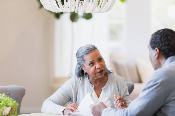 istock Mature Couple Having a Serious Discussion at Home 2198213488