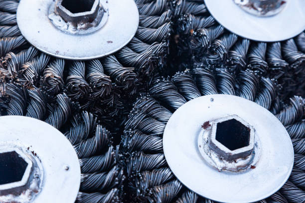 istock Steel brushes of circular type in the form of cylinders, for cleaning rust when using a cleaning machine. 2198215285