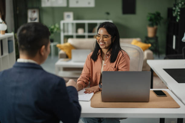 istock Engaging Business Discussion in Stylish Office 2198215366