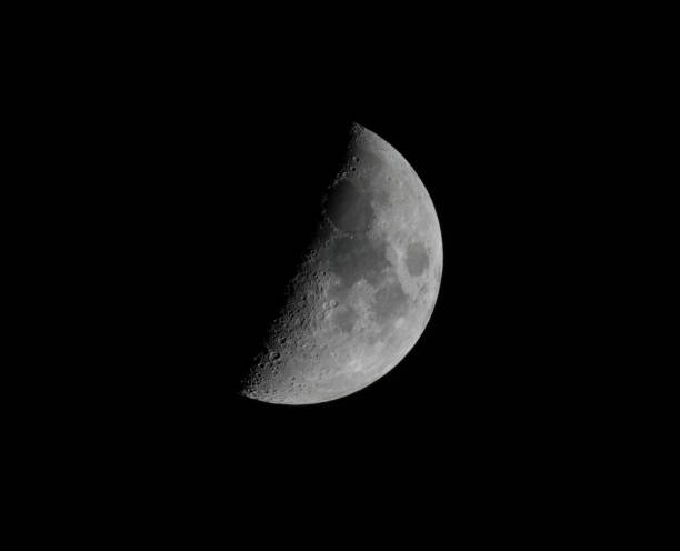 istock half waxing gibbous moon on night sky 2198217080