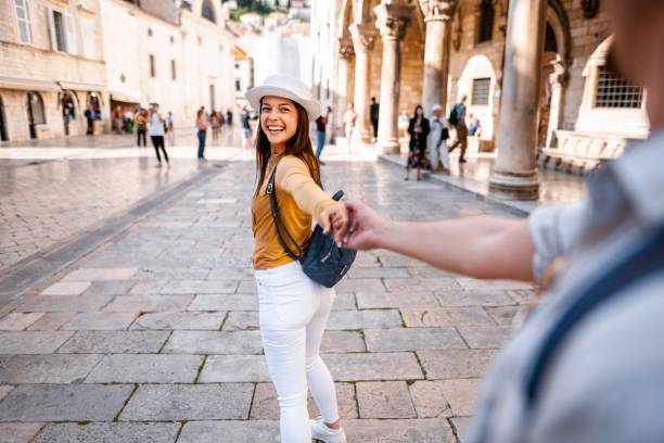 istock Young woman exploring dubrovnik's historic streets 2198217634