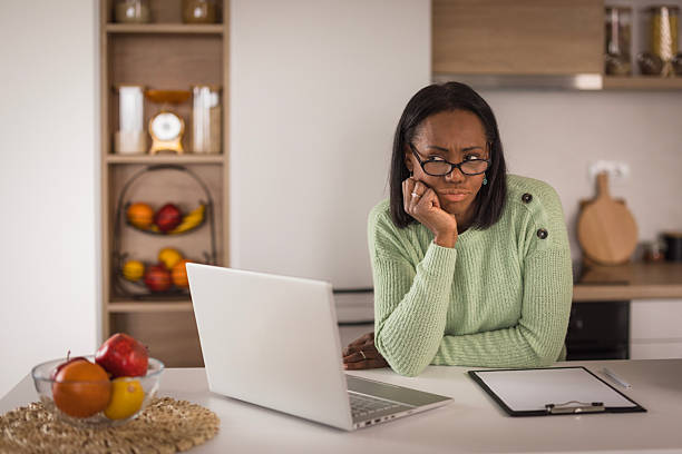 istock Serious woman contemplating work day 2198218504