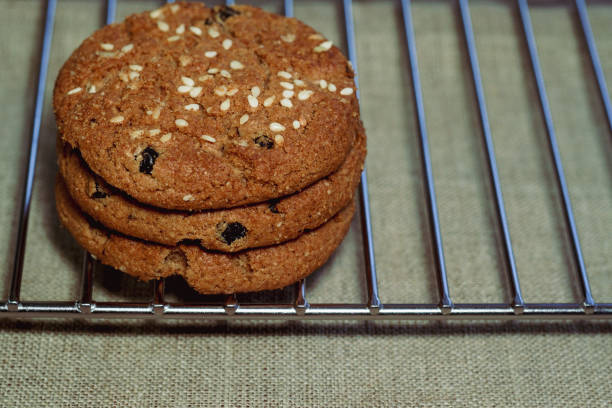 Chocolate chip cookies on metal grate