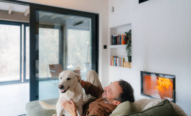 istock Enjoying together by the fireplace 2198220829