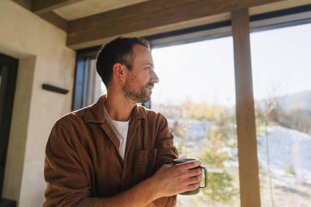 istock Winter in my cabin house 2198220912
