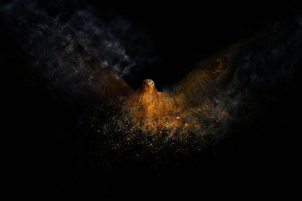 istock Bird of prey. Abstract artistic nature. Dispersion, splatter effect. Dark background. 2198226098