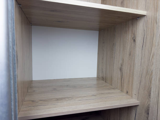 istock Large wooden shelf in empty closet at home 2198228126