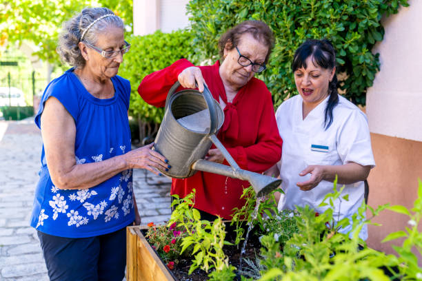 istock Elderly women engaging in gardening activity 2198230843