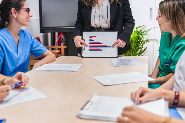istock Healthcare professionals analyzing data in meeting 2198230894