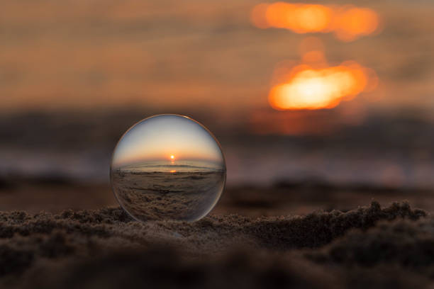 istock Virginia Beach Summer Sunrise through Glass Orb 2198231258