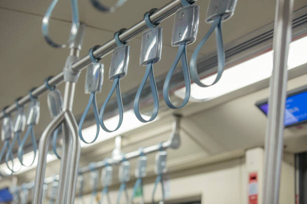 Handles for standing passenger inside a subway Overhead Handrails in a Modern Public Transport Vehicle