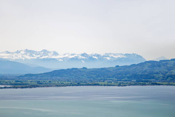 View from the Zeppelin of the Rhine tributary into Lake Constance. In the background are the Swiss Alps.