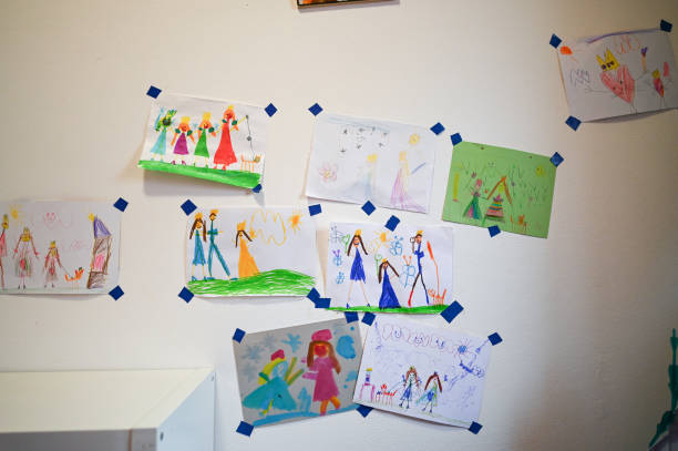 istock Child's Drawings on the wall 2198233132