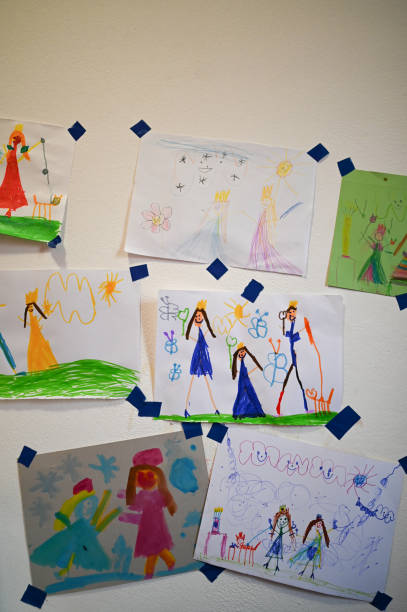 istock Childs pictures on a wall at home. 2198233143