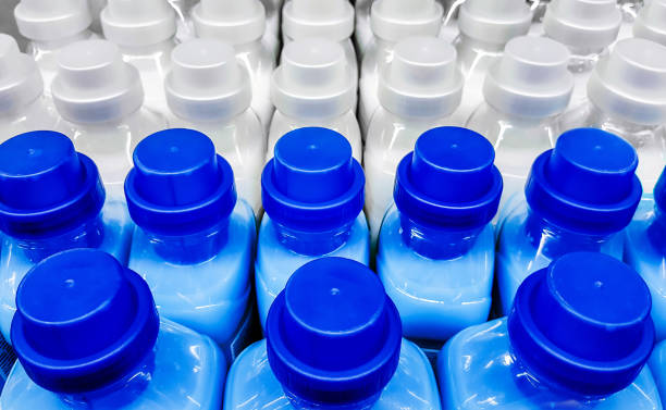 istock Row of blue and white laundry detergent bottles 2198233565