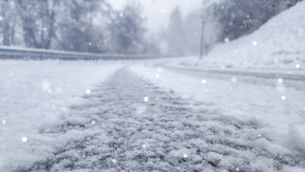 istock Snowy Road in Winter 2198233700