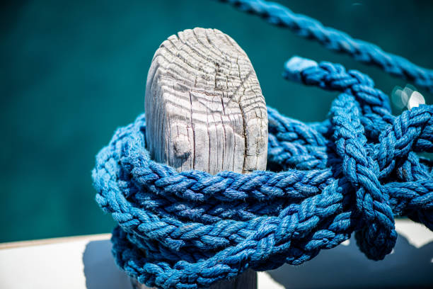 istock Seafaring Strength: Close-Up of a Thick Rope Knot on a Ship 2198238037
