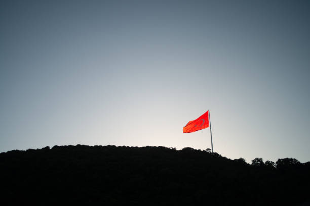 istock Majestic Triumph: The Turkish Flag atop the Mountain Summit 2198238336