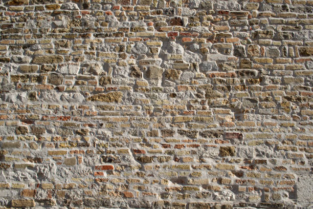Stones and bricks wall background in a loft style and rustic style