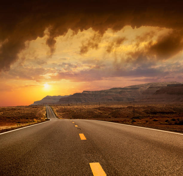 istock Sunrise view over desert highway 2198252595