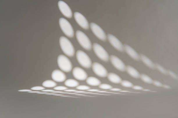 istock Circles of light filtering into the background 2198255018