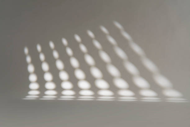 istock Circles of light filtering into the background 2198255043