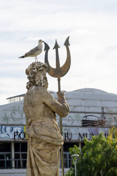 Barcelona, Spain - January 2, 2024. Sculpture in the middle of lake at Espanya Industrial Park (Parc de L'Espanya Industrial) in Barcelona, Spain