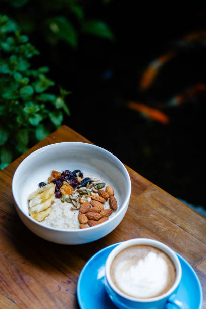 istock a bowl of oats with a latte 2198258559
