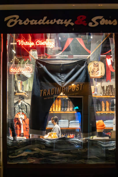 Stockholm, Sweden Dec 19, 2024 A large pair of jeans hang in the window of a denim clothing store on Gotgatan on Sodermalm.
