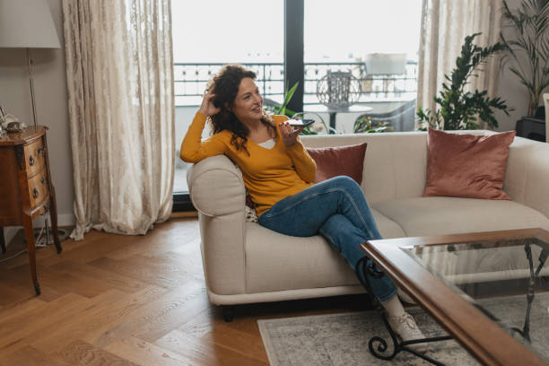 istock A woman thoughtfully chatting on her smartphone 2198269774