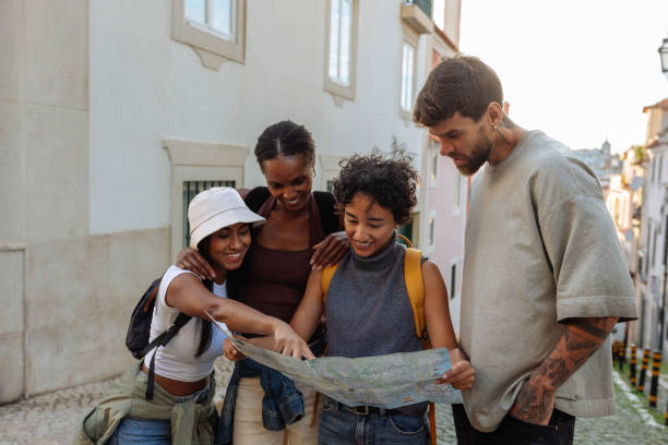istock Group of Young Adults Exploring a City Map 2198272605