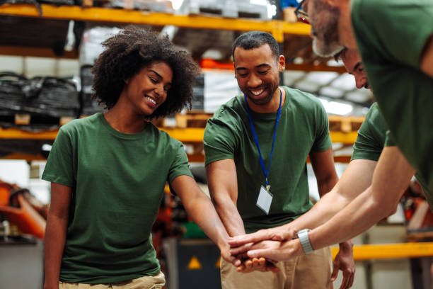 istock Diverse Team Celebrating Success in Warehouse 2198272717