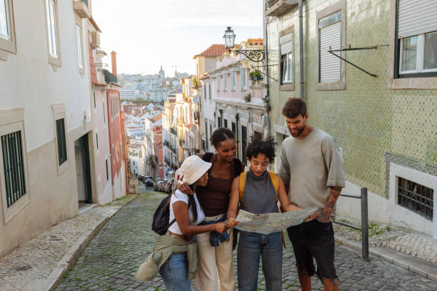 istock Group of Friends Exploring Lisbon Streets 2198272745