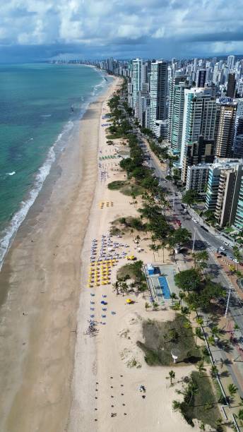 istock drone image of seaside buildings and beach 2198274315
