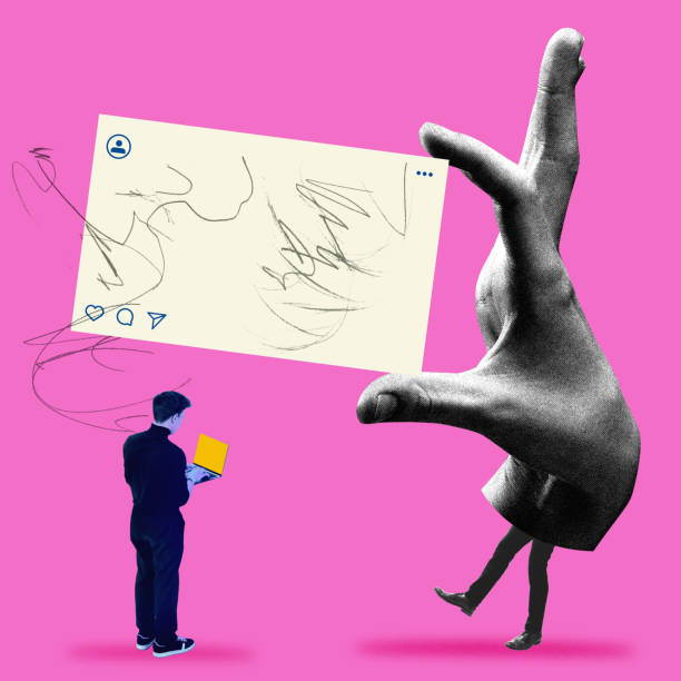istock Hand holding large social media post while man looking in laptop, representing content creation, teamwork, and social media influence. 2198275670