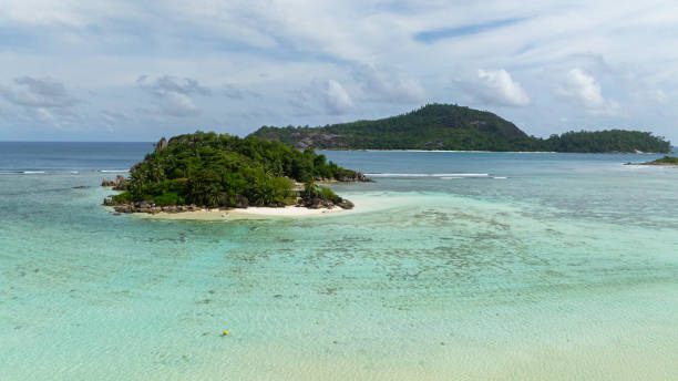 istock A tropical island with sandy shores. Seychelles. 2198279142