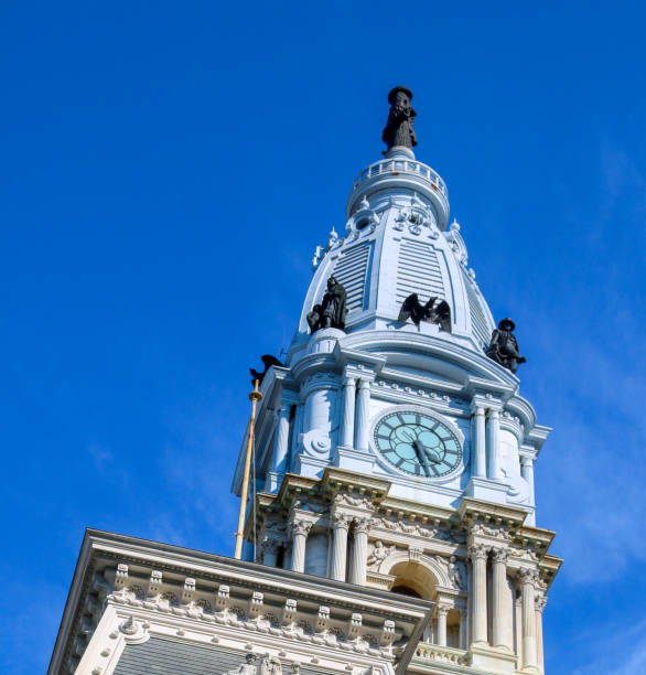 istock Historic clock tower against clear blue sky in vibrant city 2198286449