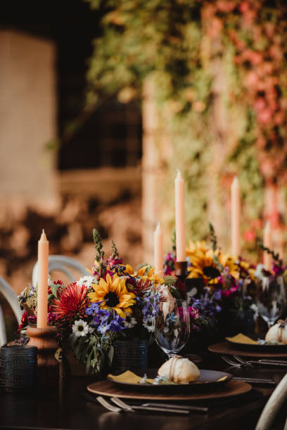 istock Close up of wedding reception dinner table with flowers and candles 2198286968