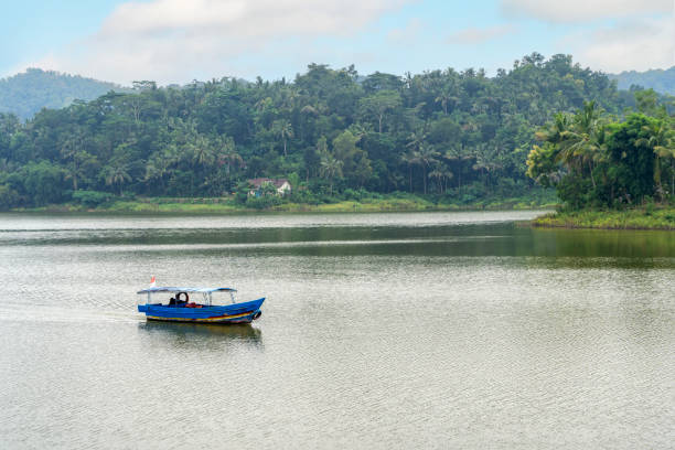 istock taditional boat on the sermo reservoir, Yogyakarta, Indonesia 2198291425