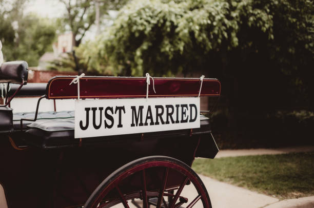 Wedding ceremony with just married sign for bride and groom