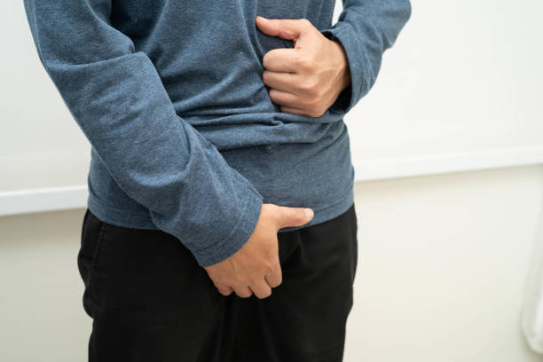 istock Hernia, Asian man stomach ache, abdominal pain and urology problem health. 2198291585