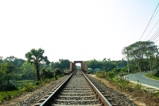 The railway line surrounded by green plants. In the field of rail transport, routes or railways, the railway line construction unit is the place designated