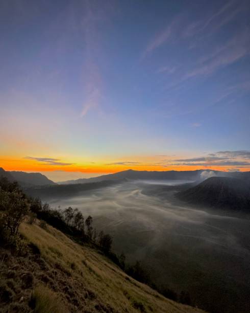 istock Bromo Highlands at Dawn with Orange-Blue Sky and Cloud Sea 2198306828