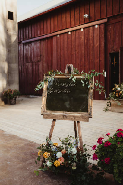istock Blank empty chalkboard gold framed sign outside of wedding reception 2198307607