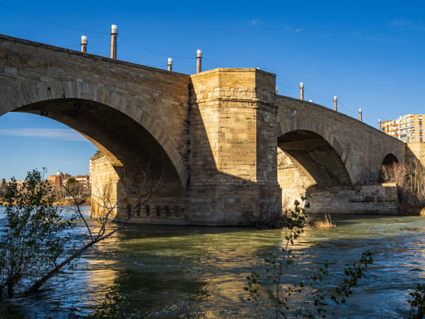 istock stone bridge over the Ebro river, in Zaragoza. Aragon. Spain 2198307802