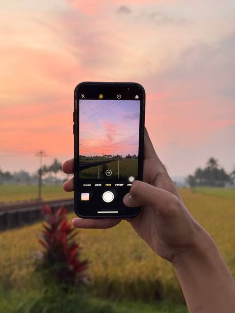 istock Aesthetic Smartphone Capturing a Sunset Landscape 2198309664