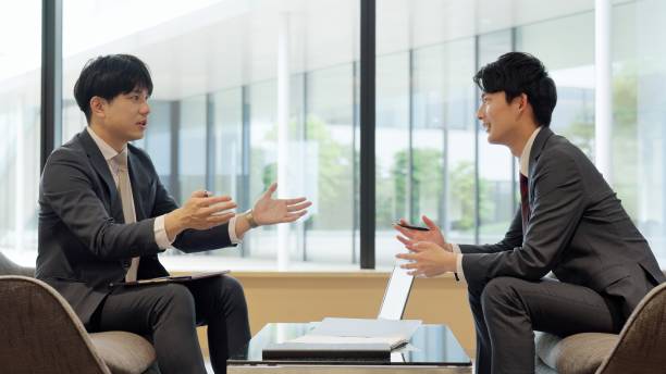 istock Asian businessmen having a meeting 2198311350