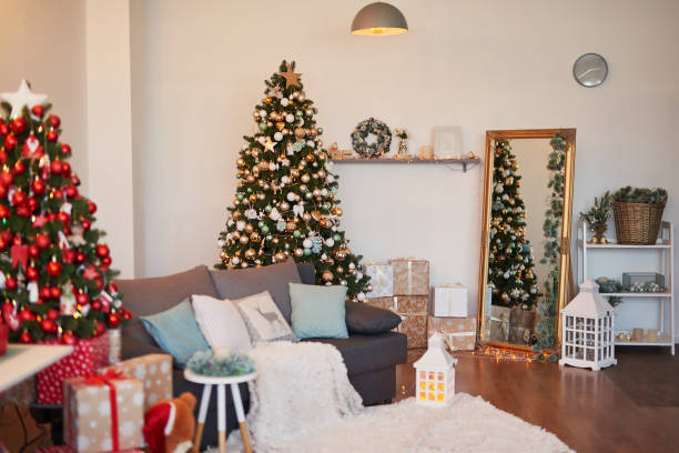 istock Interior light kitchen with christmas decor and tree. Turquoise-colored kitchen in classic style. Christmas in the kitchen. Bright kitchen in mint and white shades with Christmas. 2198324666