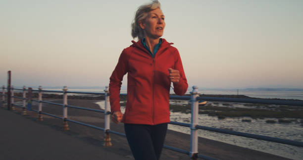 istock Early morning jog, Morecambe Bay, England 2198325334